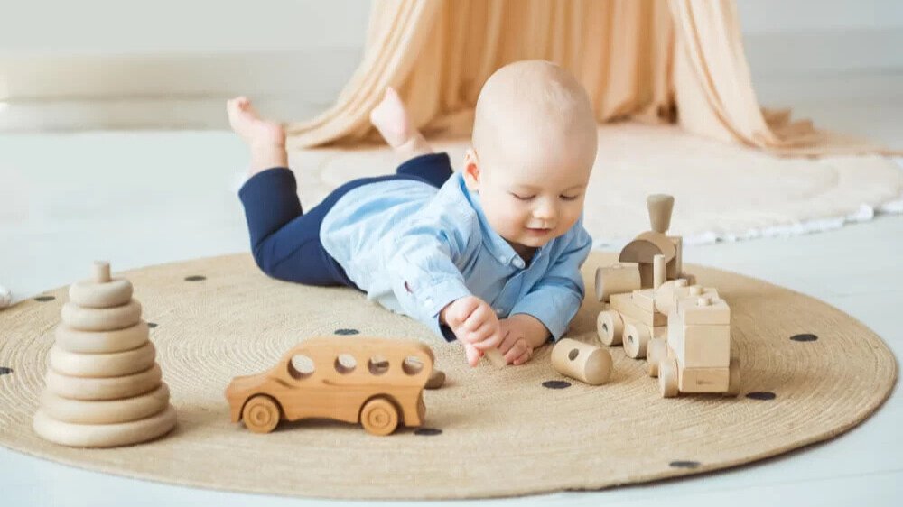 Natural Baby Toys vs Plastic Toys: Which Is Safer for Babies in India? (Parent Guide 2026)