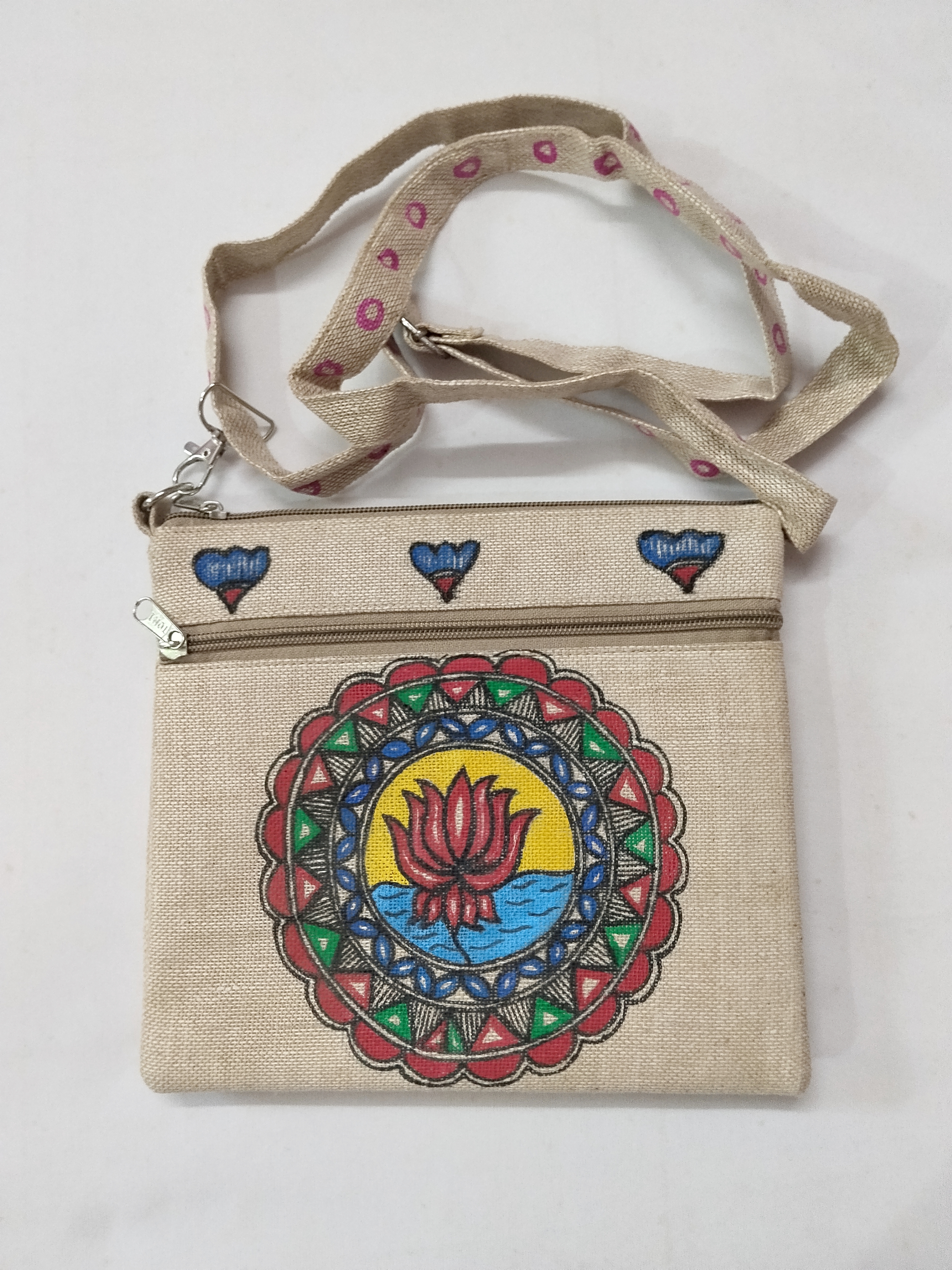 “Heritage in Style: Hand painted  Madhubani Jute Sling Bag”