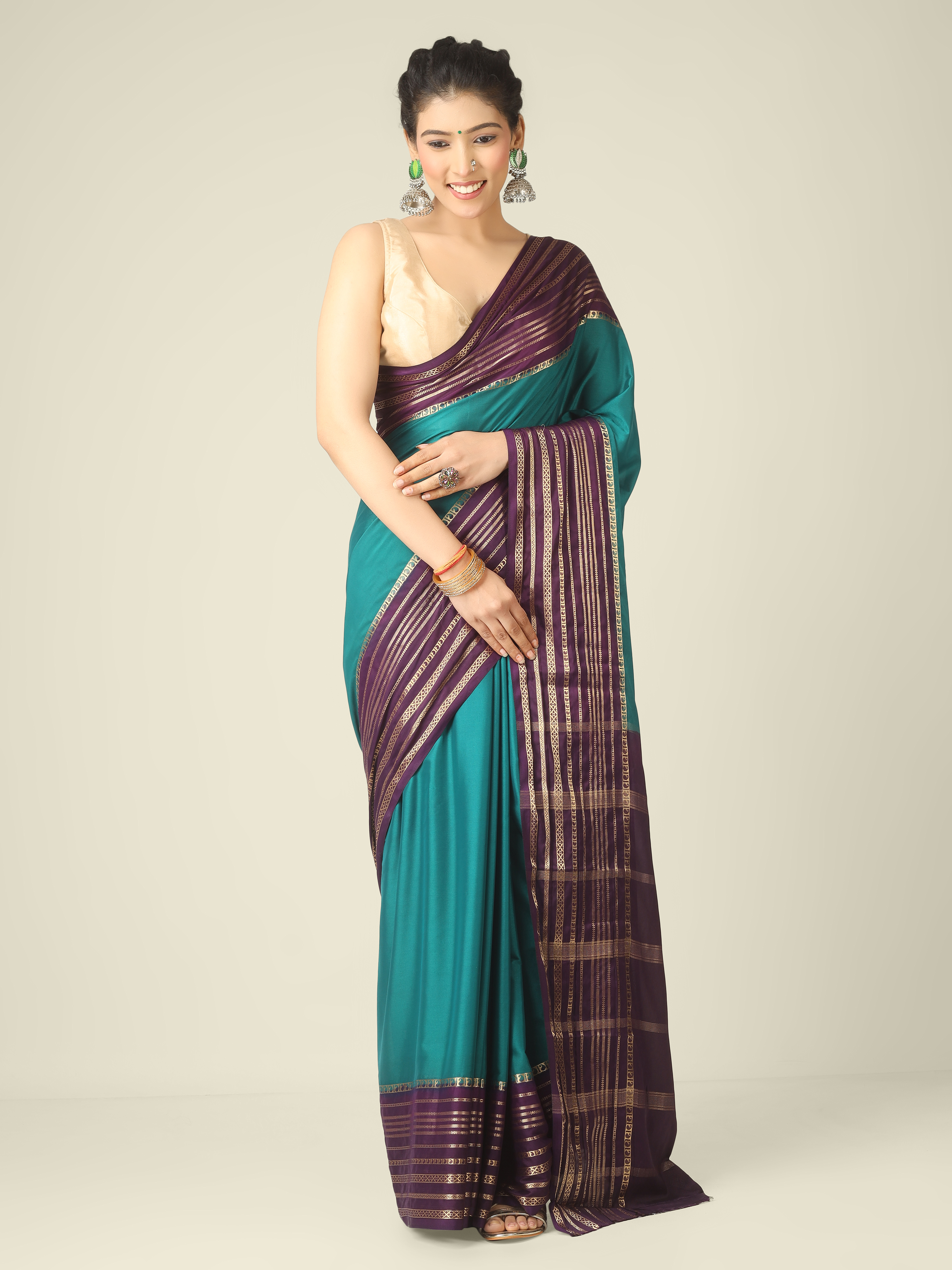 Teal Blue and Dark Purple Zari crepe Silk sarees